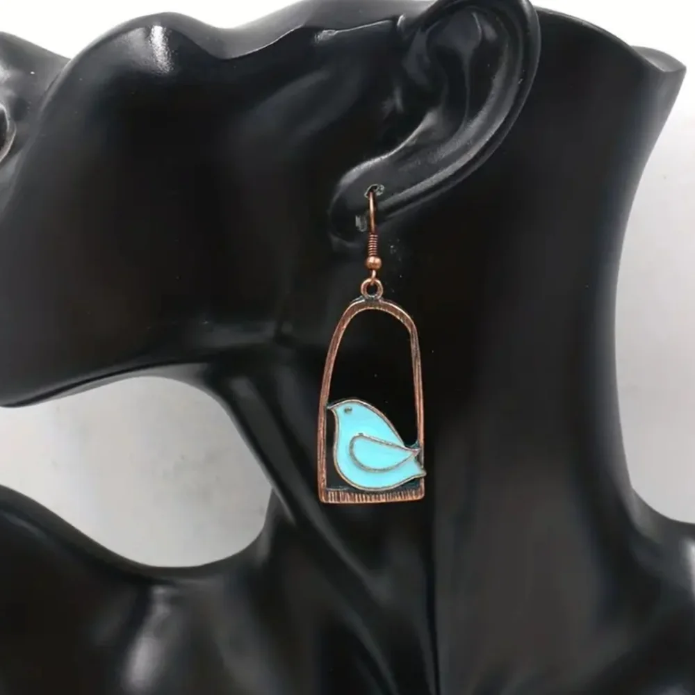 ✨New✨ Creative Bird and Cage Asymmetrical bronze earrings - Picture 2 of 3
